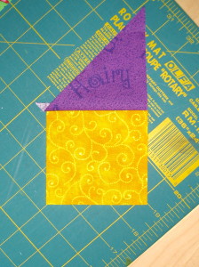 Purple and yellow sewn together.