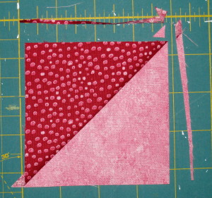 Excess fabric trimmed from right of ruler.