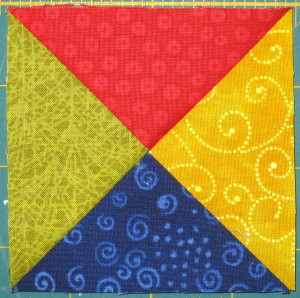 A four coloured quarter square triangle.