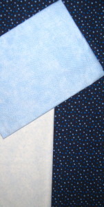 Fabrics - light, medium and dark blue.
