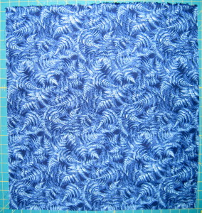 Pressed fabric on cutting mat.