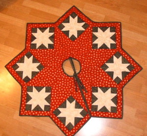 Complimentary colours of red and green create high contrast along with the white star.