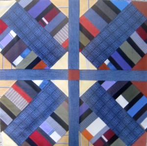 The blue and yellow/orange/rust fabrics created a cross when four blocks were put together