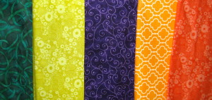 Purple dominant split complimentary plus scheme using fabric