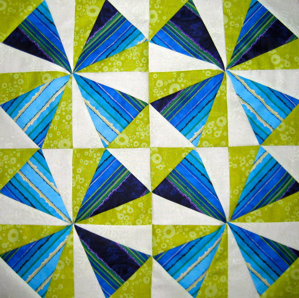 Intensity of Colour demonstrated with kaleidoscope triangles in blue and green
