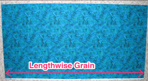 The lengthwise grain.