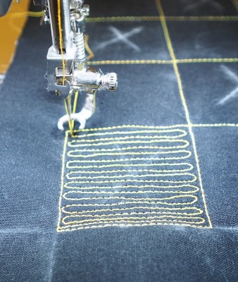 Crisscross quilting motif in position to start stitching in opposite direction