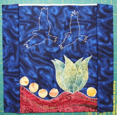 Stitch Along sunday Art Quilt with facing strips pressed over to the edges