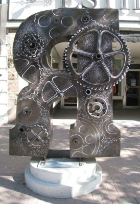 Letter R decorated with gears and cogs and wheels