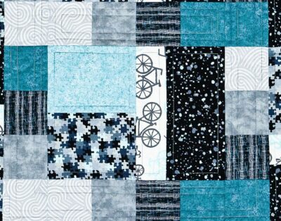 A beginner patchwork quilt with simple quilting