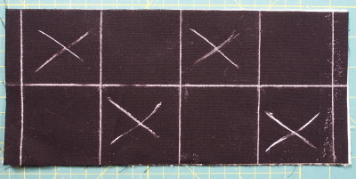 Continuous line square spiral with areas marked for quilting