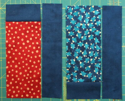 A modern quilt with the modern fabric line called Simple Marks with fabrics laid out in position in block