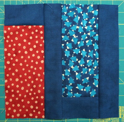 A modern quilt with the modern fabric line called Simple Marks with completed block