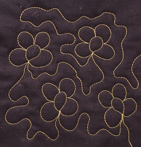 flowers stitched on fabric