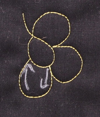 stitch third petal around the centre
