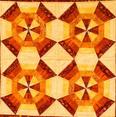 secondary design in the middle of the quilt shaped like an octagon