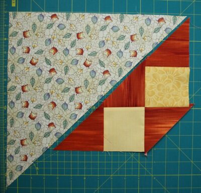 two triangle and square unit sewn together