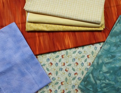 the fabrics to make the block with