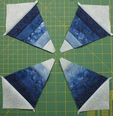main triangles and corner triangles sewn together