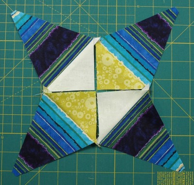corner triangles sewn to main triangles
