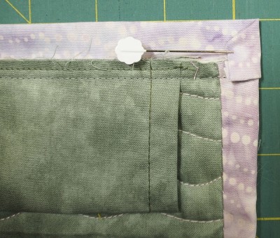corner folded over and pinned in place