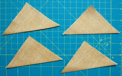 four triangles of fabric