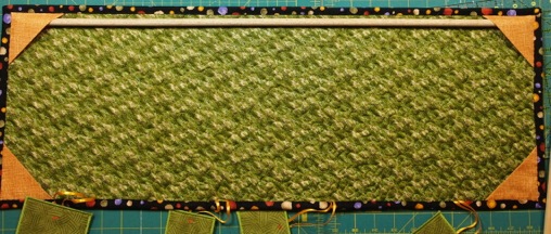 back of quilt with corner hanging tabs