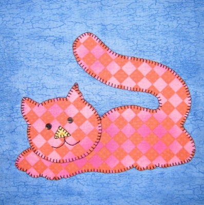 pink and orange cat with blanket stitch 