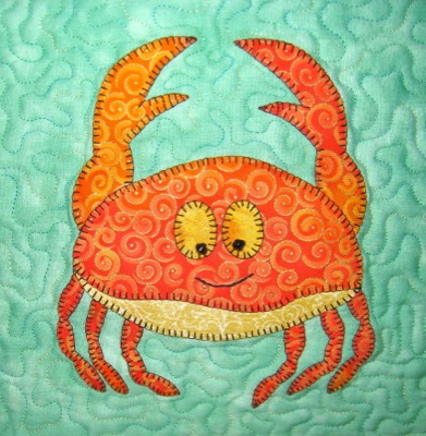 orange and yellow crab with blanket stitch