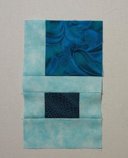 rectangle of fabric pieces sewn together