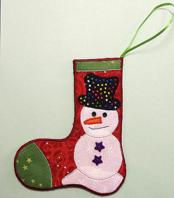 red stocking with white snowman tree ornament