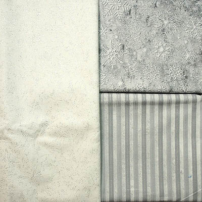 two grey fabrics and one white fabric