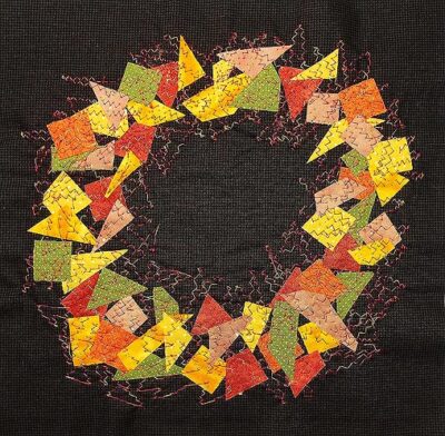 autumn coloured wreath of fabric bits