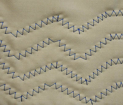 Rows of zigzag stitch in a herringbone pattern