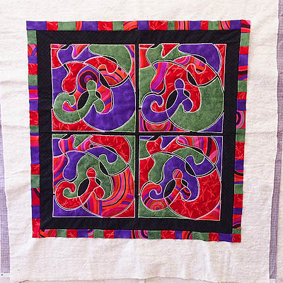 Pieced border added to the Funky J quilt