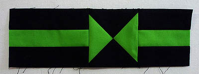 Green and black arrow strip sewn together