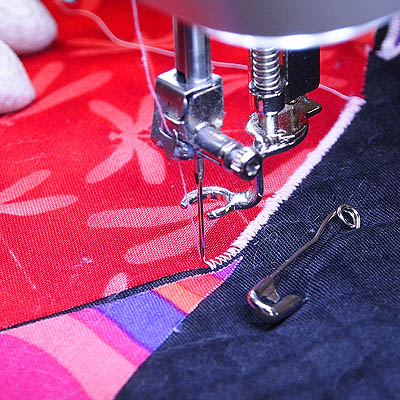 stitching a zigzag for a quarter inch or so along edge of applique