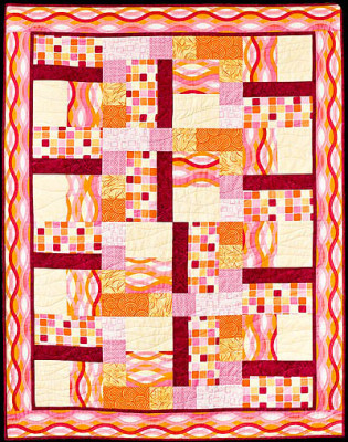 Rectangles & Squares quilt in orange, yellow and pink