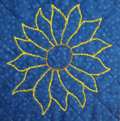 Stitching of sunflower outline on the back