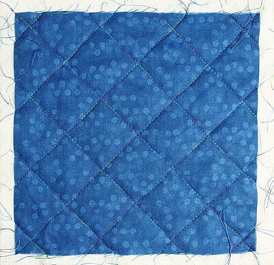Quilting lines form a cross hatch pattern