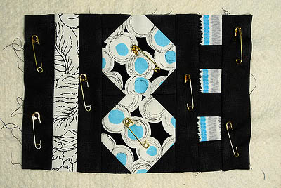 Teal, white and black mug rug top ready for quilting