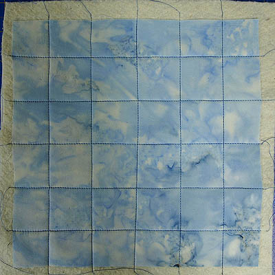 Quilting done as a checkerboard motif
