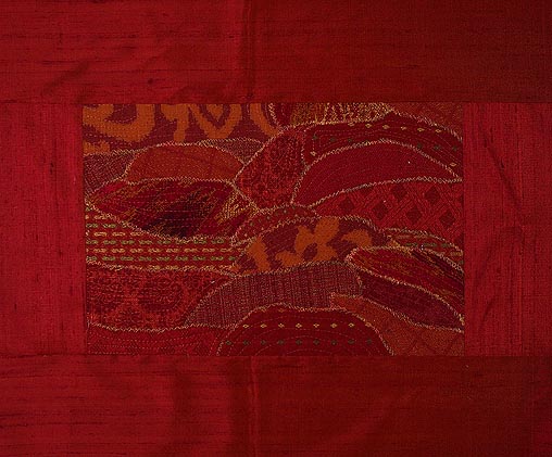 Variety of red fabrics to create the red dirt desert of Australia famed in red