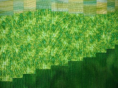quilting lines mimic a topographic map on the lime green fabric