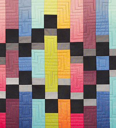 Strips of different colours broken up by black and grey squares