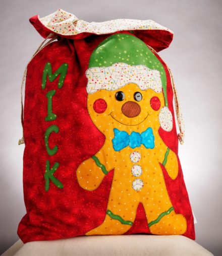 Red Santa Sac with gingerbread applique