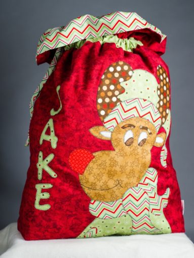 Red santa sac with Rudolph applique