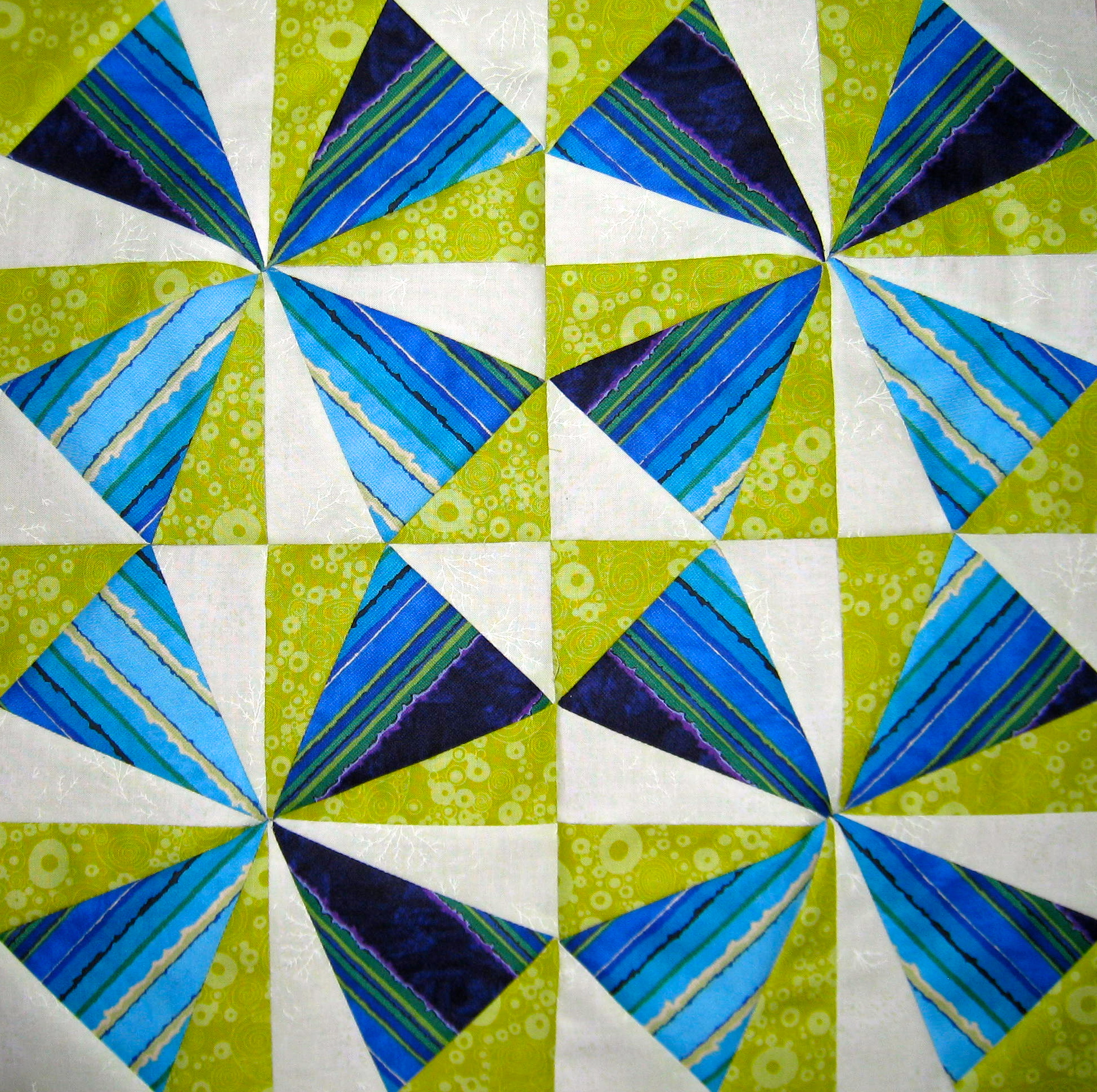 kalidescope triangles in blue and green