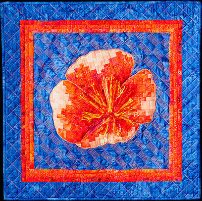 Orange bargello poppy on a blue background