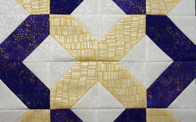 An X And O Table Topper Quilt Using Complementary Colours